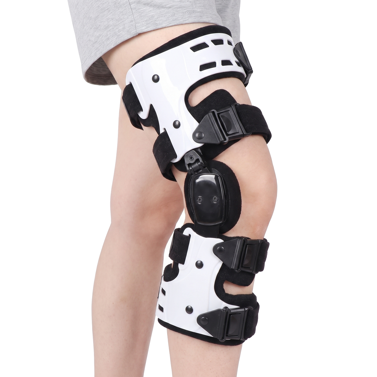 Hinged Knee Brace with Adjustable Side Hinge and Four Quick Release Straps — photo 1